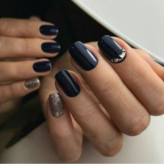 99+ Trending Black Nails Art Manicure Ideas; Black coffin nails; Black acrylic nails; long Black gel nail; short Black nails; Black cute nails; Black matte nails; Black glitter nails.