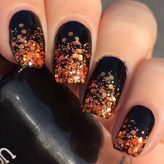 99+ Trending Black Nails Art Manicure Ideas; Black coffin nails; Black acrylic nails; long Black gel nail; short Black nails; Black cute nails; Black matte nails; Black glitter nails.