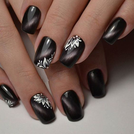 99+ Trending Black Nails Art Manicure Ideas; Black coffin nails; Black acrylic nails; long Black gel nail; short Black nails; Black cute nails; Black matte nails; Black glitter nails.