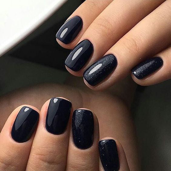 99+ Trending Black Nails Art Manicure Ideas; Black coffin nails; Black acrylic nails; long Black gel nail; short Black nails; Black cute nails; Black matte nails; Black glitter nails.