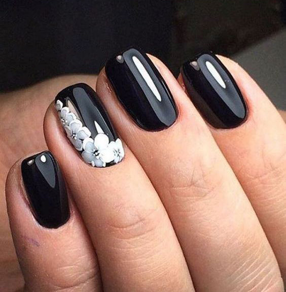 99+ Trending Black Nails Art Manicure Ideas; Black coffin nails; Black acrylic nails; long Black gel nail; short Black nails; Black cute nails; Black matte nails; Black glitter nails.