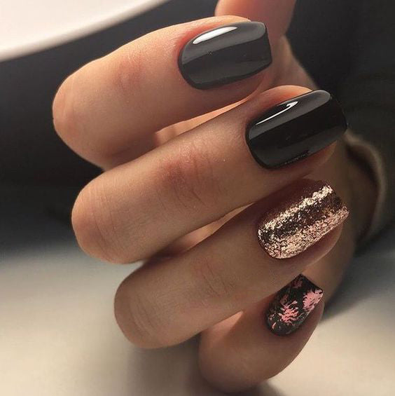 99+ Trending Black Nails Art Manicure Ideas; Black coffin nails; Black acrylic nails; long Black gel nail; short Black nails; Black cute nails; Black matte nails; Black glitter nails.