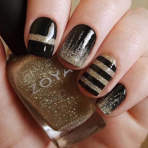 99+ Trending Black Nails Art Manicure Ideas; Black coffin nails; Black acrylic nails; long Black gel nail; short Black nails; Black cute nails; Black matte nails; Black glitter nails.