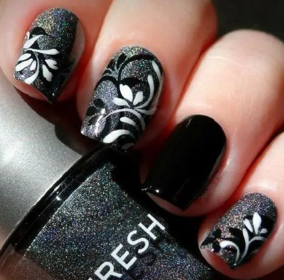 99+ Trending Black Nails Art Manicure Ideas; Black coffin nails; Black acrylic nails; long Black gel nail; short Black nails; Black cute nails; Black matte nails; Black glitter nails.