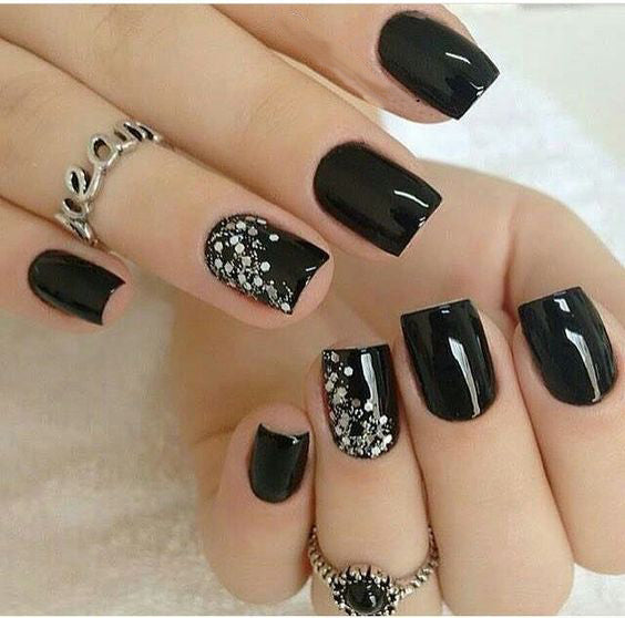 99+ Trending Black Nails Art Manicure Ideas; Black coffin nails; Black acrylic nails; long Black gel nail; short Black nails; Black cute nails; Black matte nails; Black glitter nails.