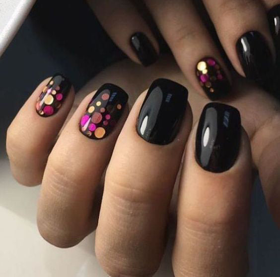 99+ Trending Black Nails Art Manicure Ideas; Black coffin nails; Black acrylic nails; long Black gel nail; short Black nails; Black cute nails; Black matte nails; Black glitter nails.