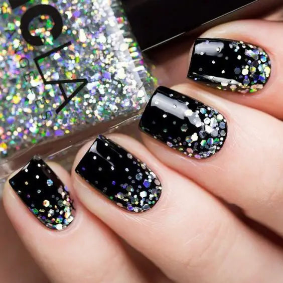 99+ Trending Black Nails Art Manicure Ideas; Black coffin nails; Black acrylic nails; long Black gel nail; short Black nails; Black cute nails; Black matte nails; Black glitter nails.