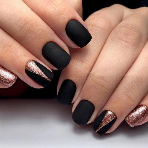 99+ Trending Black Nails Art Manicure Ideas; Black coffin nails; Black acrylic nails; long Black gel nail; short Black nails; Black cute nails; Black matte nails; Black glitter nails.