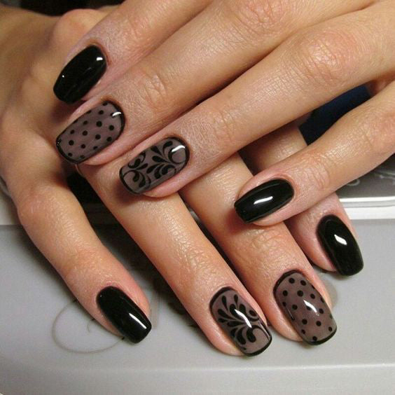 99+ Trending Black Nails Art Manicure Ideas; Black coffin nails; Black acrylic nails; long Black gel nail; short Black nails; Black cute nails; Black matte nails; Black glitter nails.