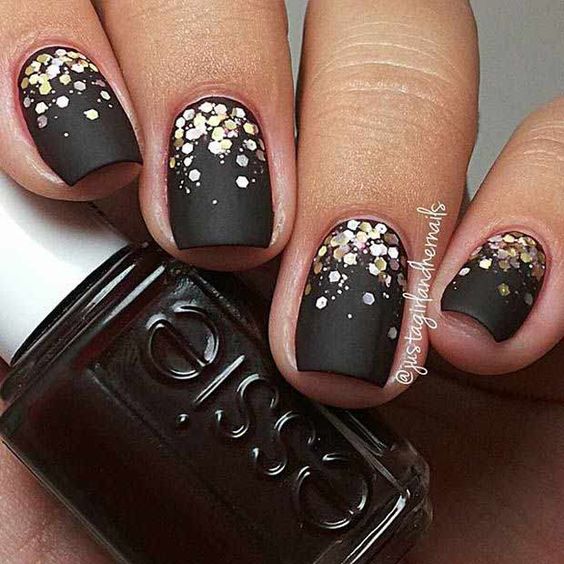 99+ Trending Black Nails Art Manicure Ideas; Black coffin nails; Black acrylic nails; long Black gel nail; short Black nails; Black cute nails; Black matte nails; Black glitter nails.