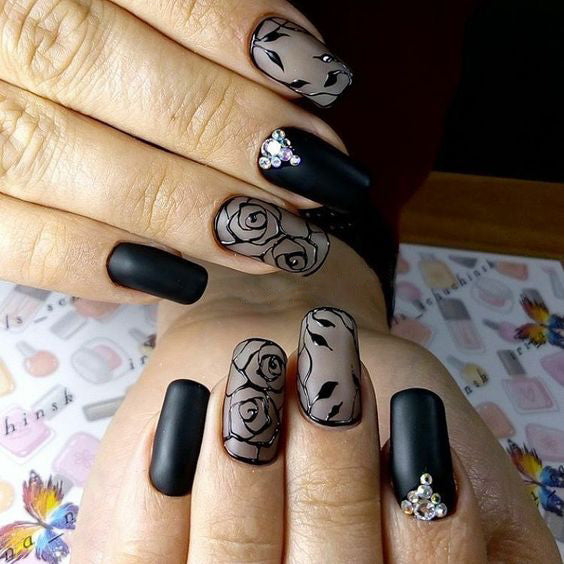 99+ Trending Black Nails Art Manicure Ideas; Black coffin nails; Black acrylic nails; long Black gel nail; short Black nails; Black cute nails; Black matte nails; Black glitter nails.