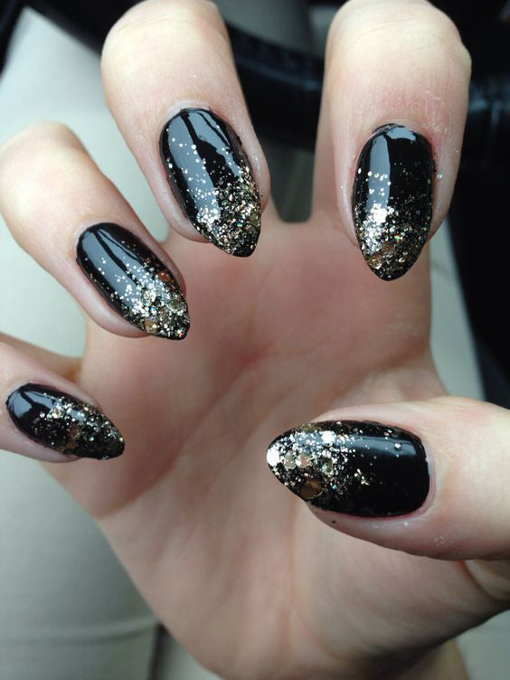 99+ Trending Black Nails Art Manicure Ideas; Black coffin nails; Black acrylic nails; long Black gel nail; short Black nails; Black cute nails; Black matte nails; Black glitter nails.