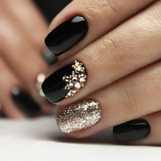 99+ Trending Black Nails Art Manicure Ideas; Black coffin nails; Black acrylic nails; long Black gel nail; short Black nails; Black cute nails; Black matte nails; Black glitter nails.