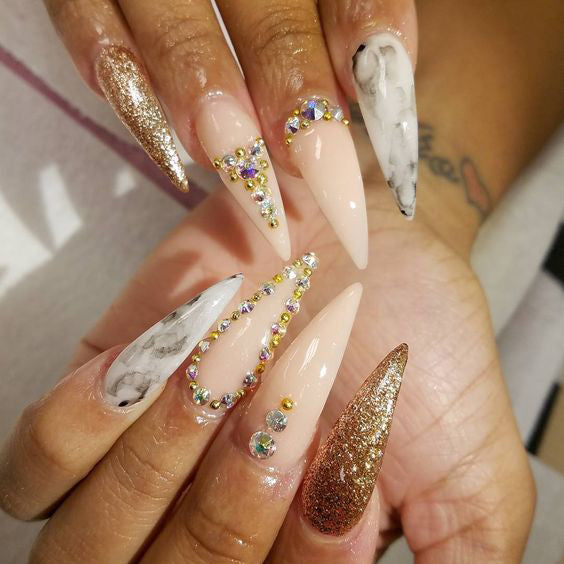 21+ Stylish Nude Stiletto Nails To Be In Trends 2019; Gorgeous Glitter Stiletto Nails; Nude Stiletto nails; cute Stiletto nails; Stiletto coffin nails; easy Stiletto nails; Stiletto nails designs;