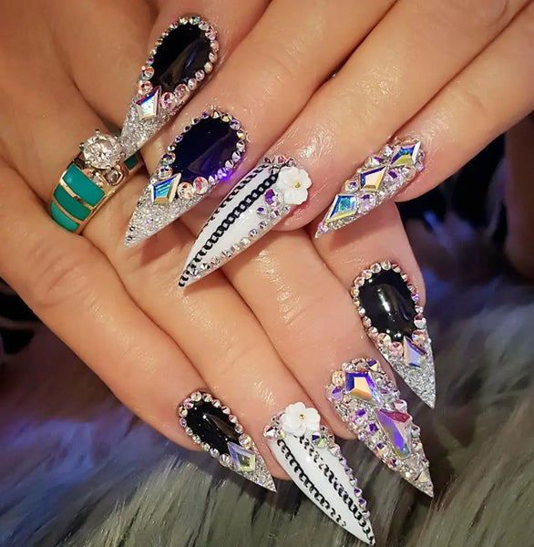 30 cool and trendy stiletto nail art designs; Stiletto Nail Designs; Bling Stiletto Nail; Ombre Stiletto Nail; Simple Stiletto Nail; Acrylic Coffin Stiletto Nail.