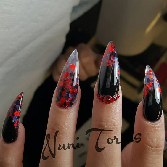 Best Black Stiletto Nails Designs For Your Halloween； Black nails; black stiletto nails; black and white; stiletto nails; long nails; nails addict; nails magazine; gothic nails; Halloween nails