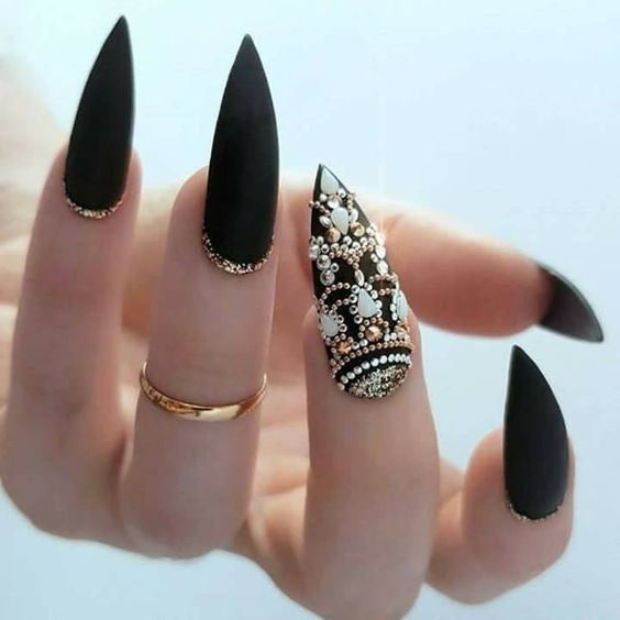 Best Black Stiletto Nails Designs For Your Halloween； Black nails; black stiletto nails; black and white; stiletto nails; long nails; nails addict; nails magazine; gothic nails; Halloween nails