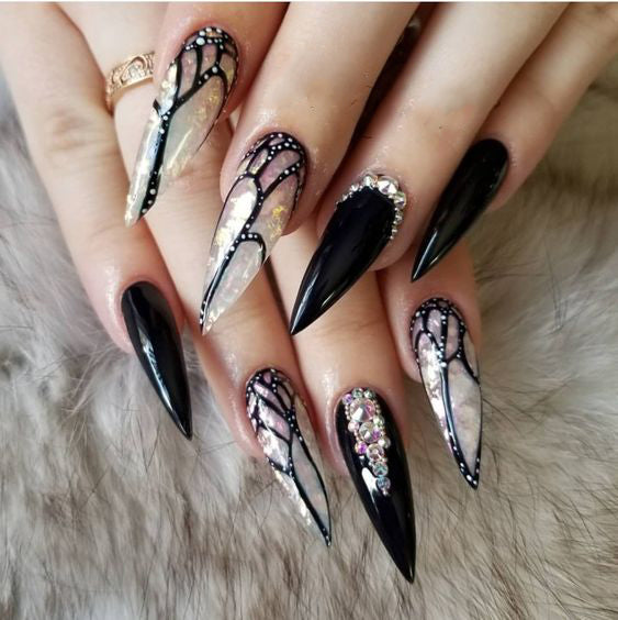 Best Black Stiletto Nails Designs For Your Halloween； Black nails; black stiletto nails; black and white; stiletto nails; long nails; nails addict; nails magazine; gothic nails; Halloween nails