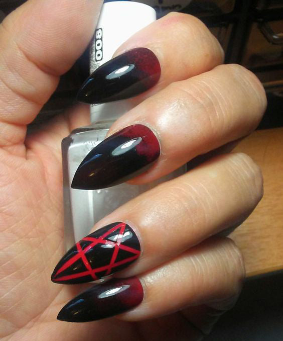 Best Black Stiletto Nails Designs For Your Halloween； Black nails; black stiletto nails; black and white; stiletto nails; long nails; nails addict; nails magazine; gothic nails; Halloween nails