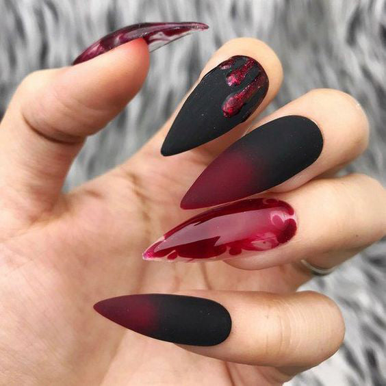 Best Black Stiletto Nails Designs For Your Halloween； Black nails; black stiletto nails; black and white; stiletto nails; long nails; nails addict; nails magazine; gothic nails; Halloween nails