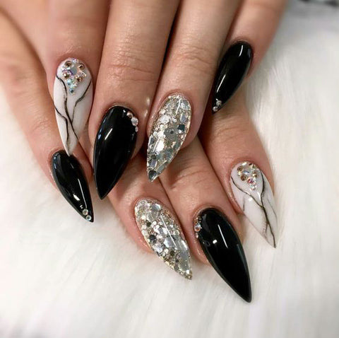 Best Black Stiletto Nails Designs For Your Halloween； Black nails; black stiletto nails; black and white; stiletto nails; long nails; nails addict; nails magazine; gothic nails; Halloween nails