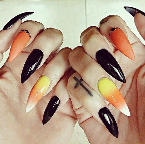 Best Black Stiletto Nails Designs For Your Halloween； Black nails; black stiletto nails; black and white; stiletto nails; long nails; nails addict; nails magazine; gothic nails; Halloween nails