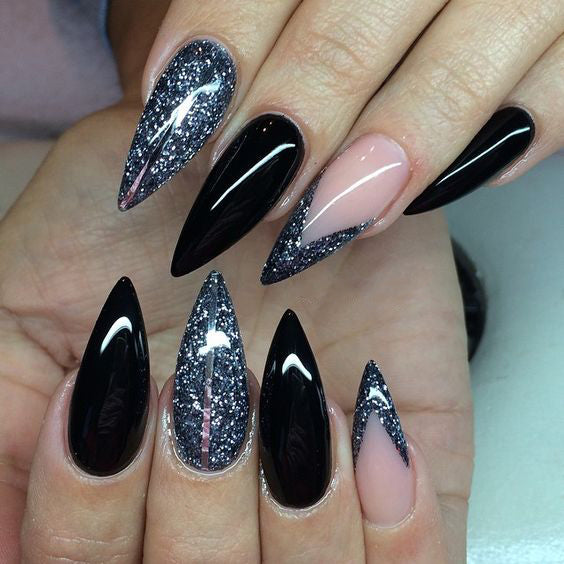 Best Black Stiletto Nails Designs For Your Halloween； Black nails; black stiletto nails; black and white; stiletto nails; long nails; nails addict; nails magazine; gothic nails; Halloween nails