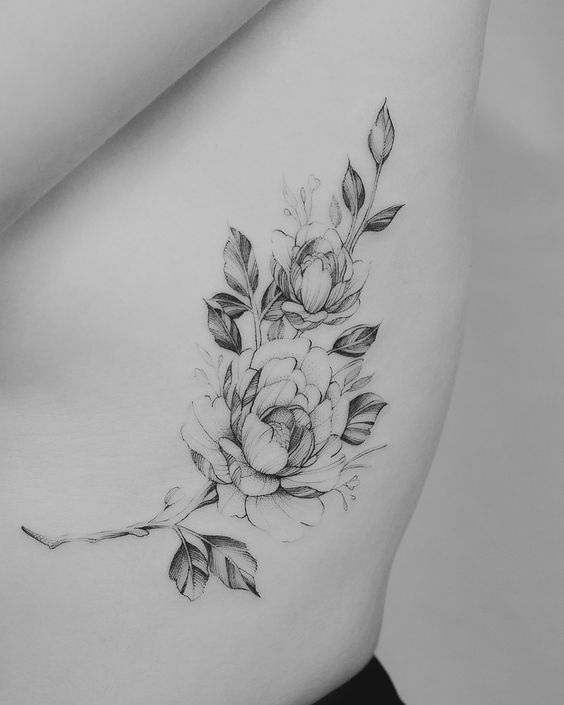 45 Charming and Irresistible Rib Tattoos Designs