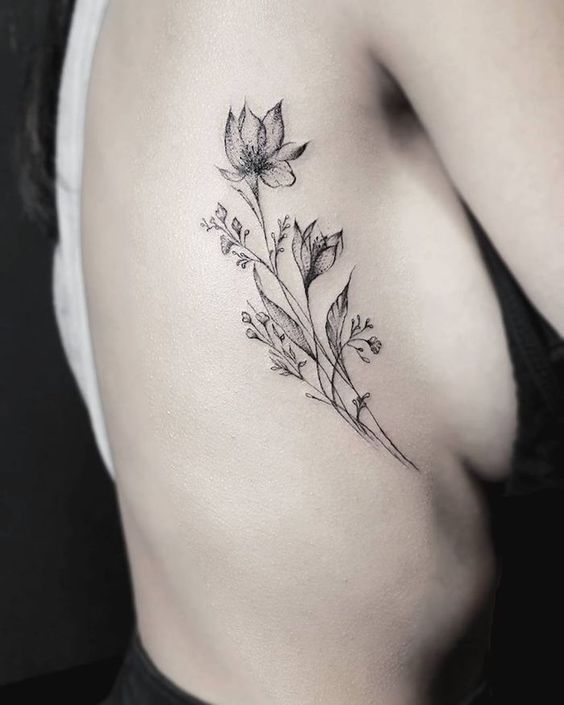 45 Charming and Irresistible Rib Tattoos Designs