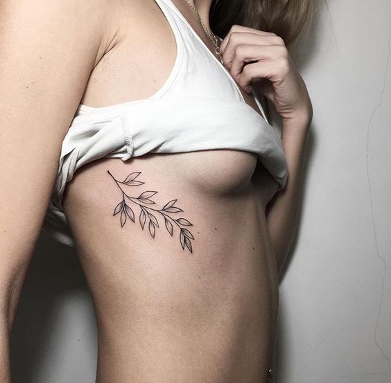 45 Charming and Irresistible Rib Tattoos Designs