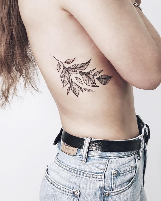 45 Charming and Irresistible Rib Tattoos Designs